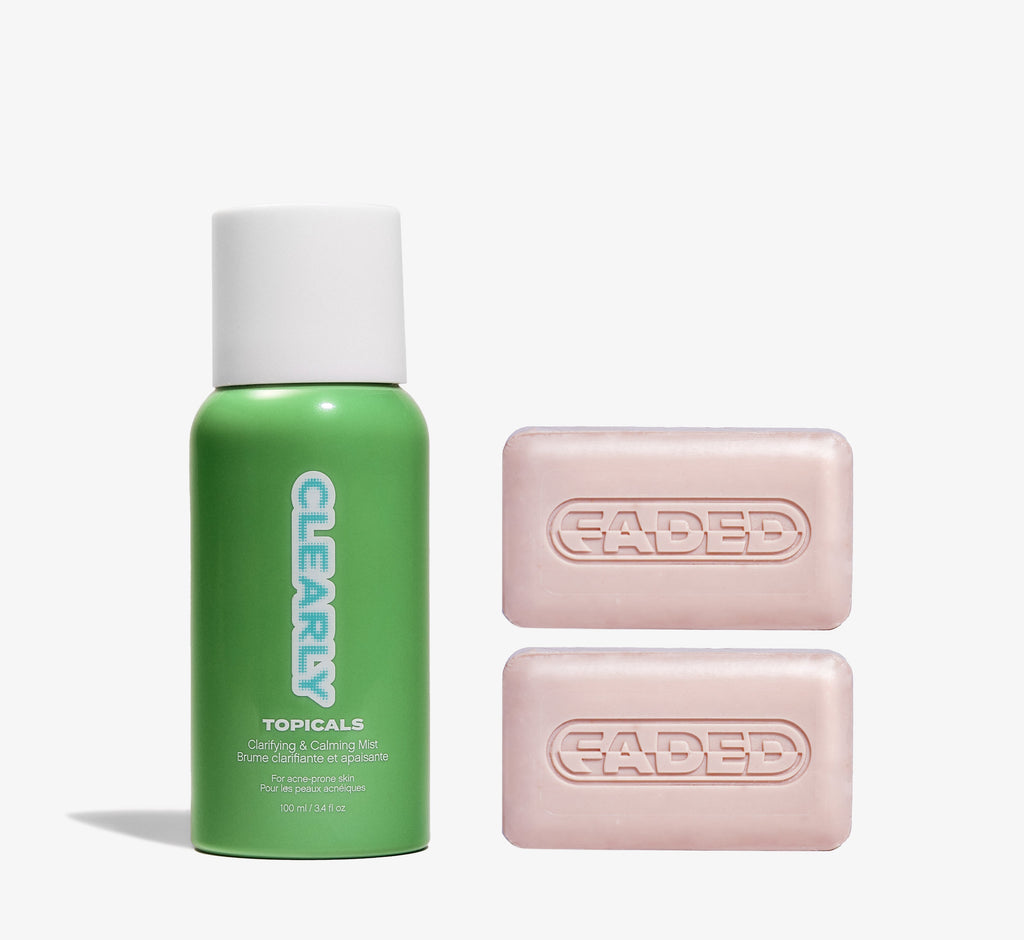 Acne skincare bundle from Topicals featuring the Clearly Clarifying & Calming Mist alongside two pink Faded Brightening Cleansing Bars on a white background.